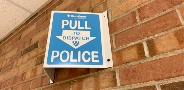 Joliet West’s latest security installment the Bluepoint Alert System. Mounted along a D building hallway leading into the field house. Photo courtesy of Megan Krok.