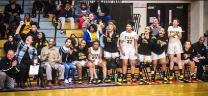 Girls varsity basketball team cheering after scoring. Photo courtesy of
@JWGirlsBball Twitter