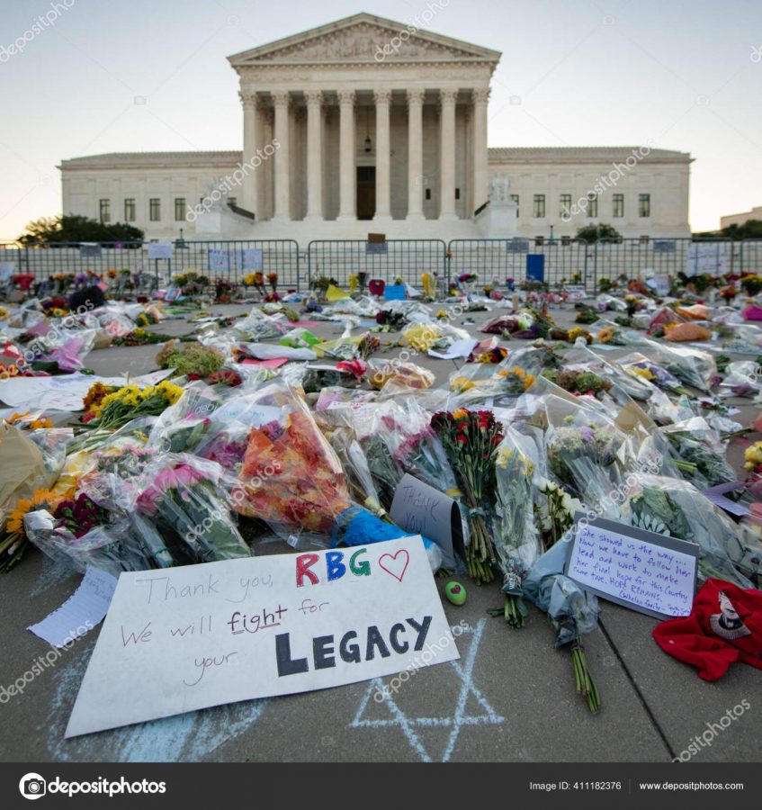 depositphotos_411182376-stock-photo-notes-flowers-left-supreme-court (1)