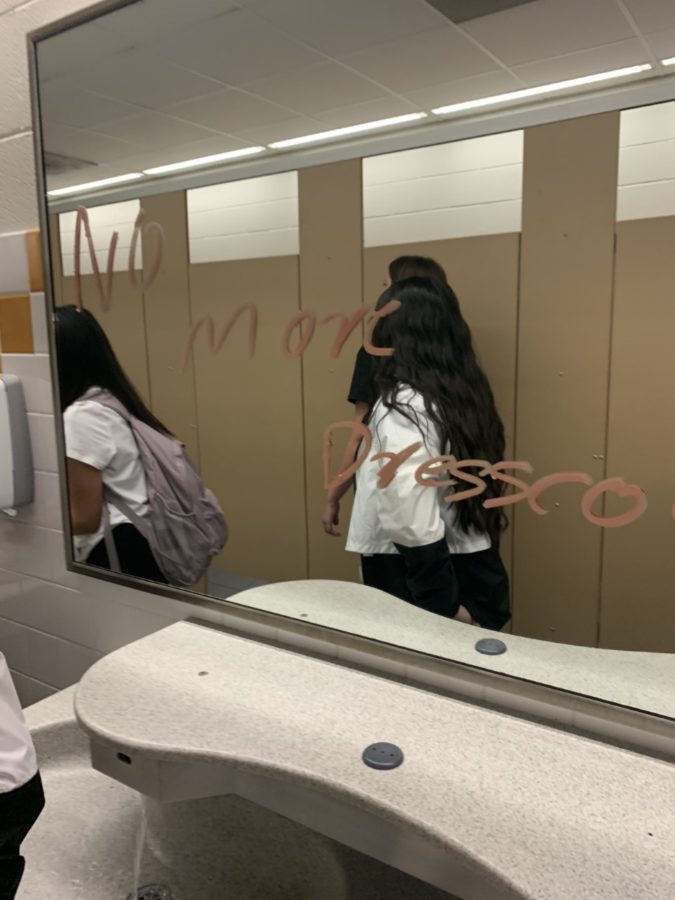 Messages such as No More Dresscode were written on bathroom mirrors. 