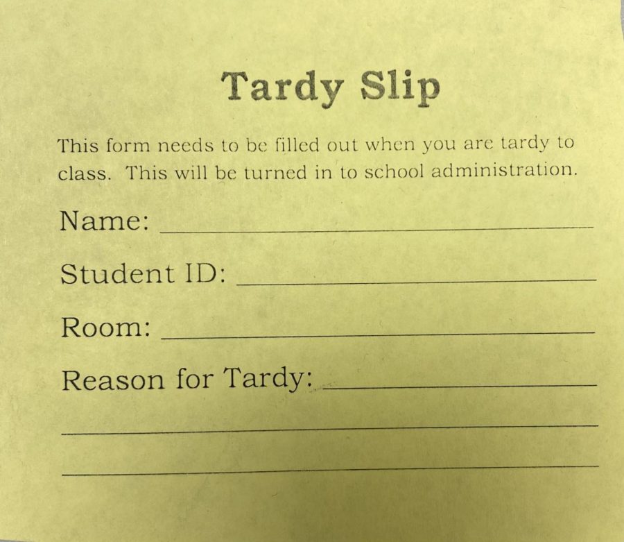 Students who arrive to class late are given a tardy slip which administrators
use to track the tardy data. Photo courtesy of Haley Maser.