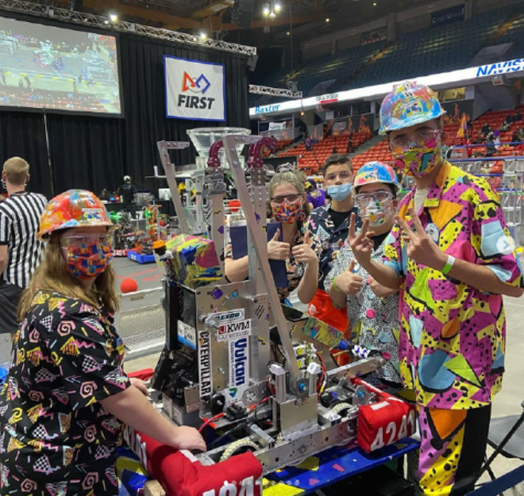 The Steel Tigers team with their robot shortly before their largest competition at UIC. Image courtesy of steeltigers4241 on Instagram.