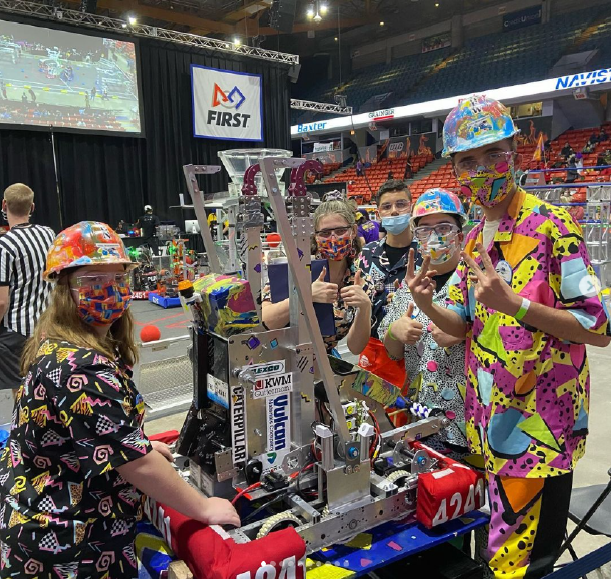 The Steel Tigers team with their robot shortly before their largest competition at UIC. Image courtesy of steeltigers4241 on Instagram.